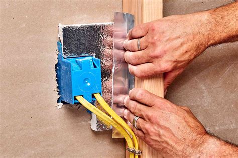 insulating electrical boxes in exterior walls|installing insulation around electrical boxes.